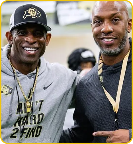 Coach Deion Sanders and NBA Star Chauncey Billups post for a picture