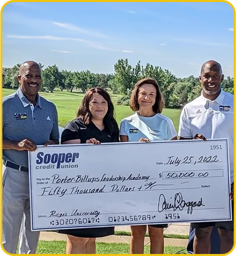 Members of the PBLA Board pose with a check from Climb Credit Union